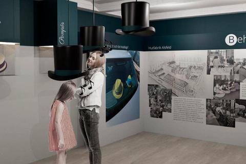 Eine große Schautafel widmet sich der Alsfelder Hutfabrik, "Soundduschen" zaubern Informationen dazu aus dem Hut.  Visualisierung: ConCultura/GMV Alsfeld 